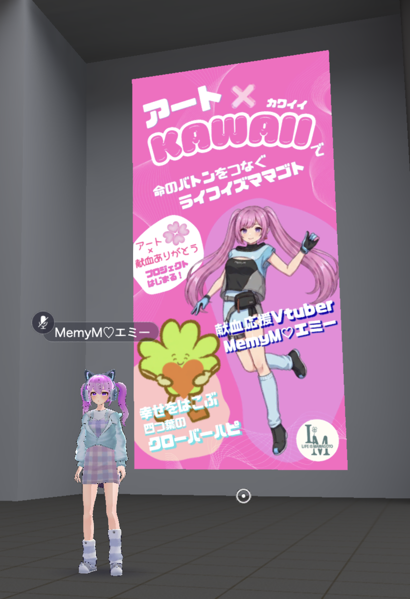 metacomiエントランスに掲示されたLIFE IS MAMAGOTOの大型ポスター